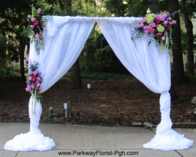 Pipe and Drape with FLower Clusters